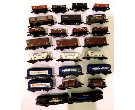 Twenty four assorted N gauge wagons including car transporter, hopper, vans, opens, brake etc. P&amp;P Group 1 (£14+VAT for t