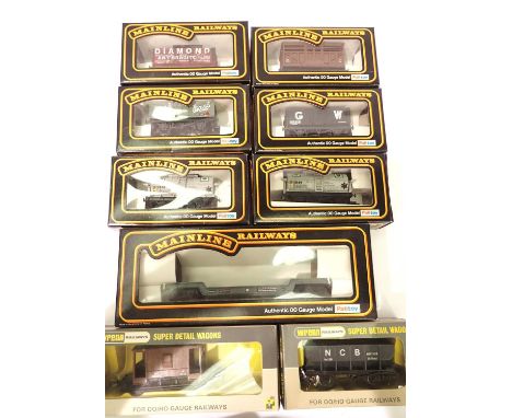 OO scale Mainline wagons including; Bogie Well, BP tank x2, Cattle, Open x3 and a Wrenn NCB Hopper and brake van. P&amp;P Gro