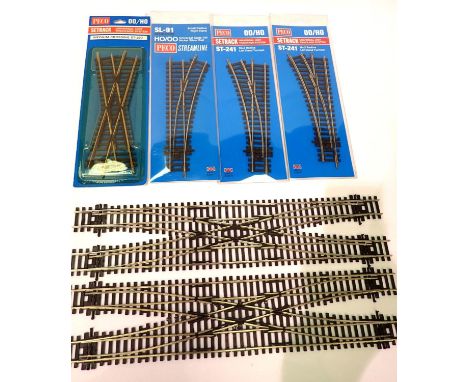 Peco ST241 x2 L/H point, SL 91 RH point, ST 250 medium crossing, all in packets and two scissor crossing unboxed. P&amp;P Gro
