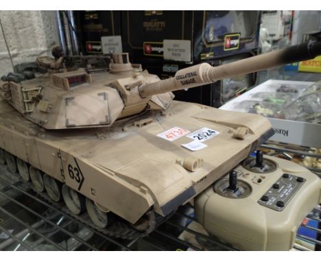Hobby Engine remote controlled M1A2 tank with machine gun and cannonCondition Report: The tank is 35 cm long and is remote co