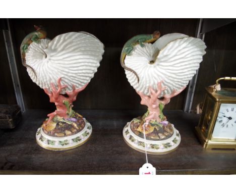 A pair of Victorian Royal Worcester Nautilus shell vases,&nbsp;23cm high.&nbsp; 