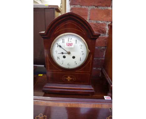 An circa 1900 mahogany and inlaid mantel clock,&nbsp;37cm high.&nbsp; 