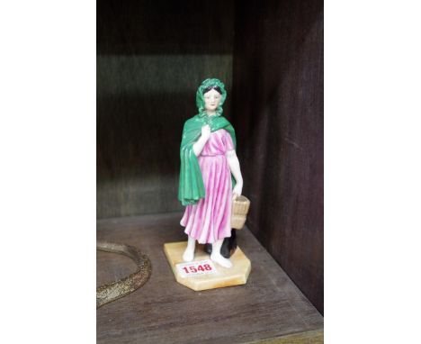 A Royal Worcester figure 'Colleen', modelled by James Hadley. No.1874, 16.5cm high. 