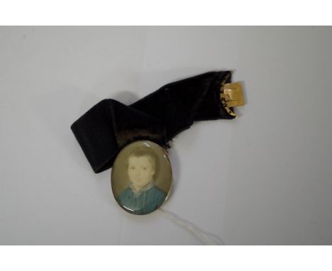 English School, late 18th century, a head and shoulders&nbsp;portrait miniature of a young boy, 3.5 x 2.8cm, in a gilt frame.
