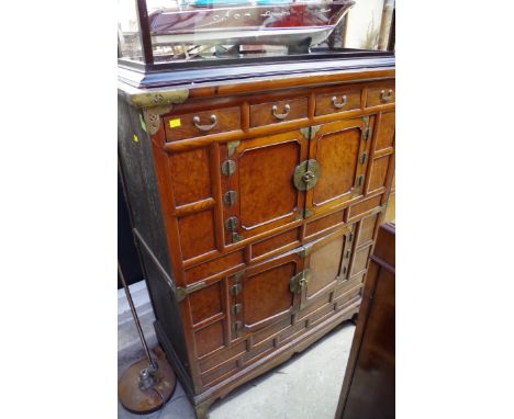 An antique Chinese elm and burr elm cabinet, 119.5cm wide. 