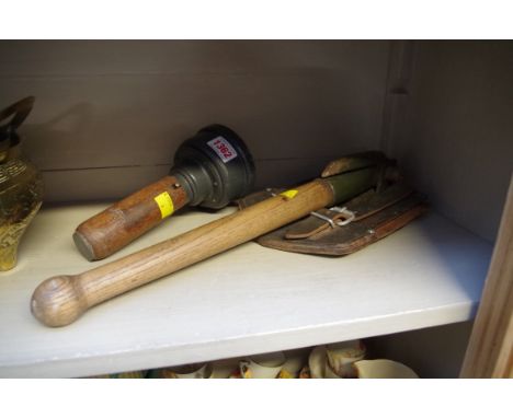 A 1960s military entrenching tool; together with a hand held nautical compass. 