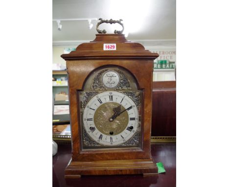 An 18th century style walnut musical bracket type clock,&nbsp;42cm high.&nbsp; 