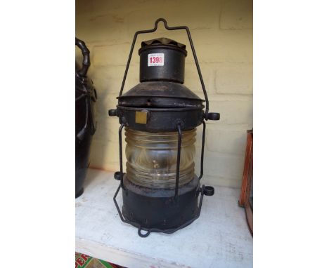 An old black painted and brass ship's 'Ankerlicht' lantern. 