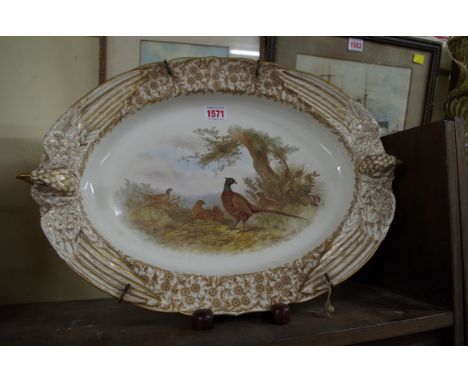 A rare Victorian Royal Worcester Vitreous twin handled oval game dish, circa 1890, moulded with bird's heads, 46cm wide. 