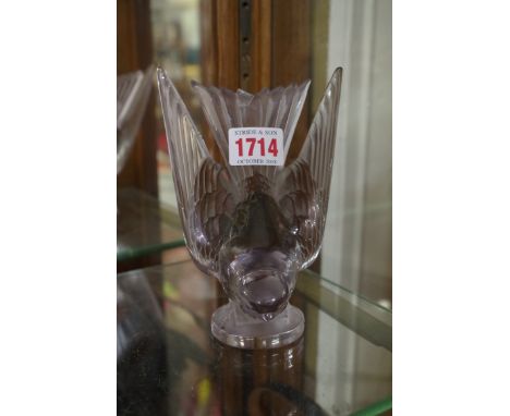 A rare R. Lalique 'Hirondelle' clear glass car mascot, (chipped). 