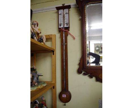 A Victorian oak 'Farmer's Barometer', by Negretti &amp; Zanbra. 