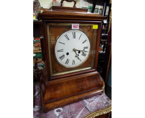 A mid 19th century Black Forest walnut mantel clock, with double fusee movement, 49cm high, with pendulum. 