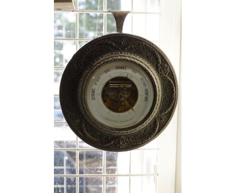 A cast metal framed holosteric barometer,&nbsp;21cm diameter.&nbsp; 