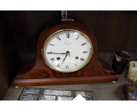 A reproduction mahogany mantel clock,&nbsp;by Comitti, 34cm wide.&nbsp; 