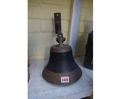 An old wall mounted bell,&nbsp;with clapper.&nbsp; 