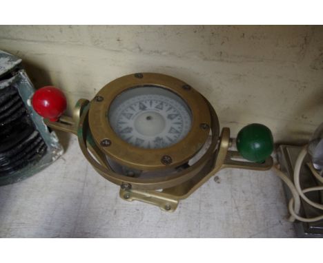 A brass cased nautical compass.&nbsp; 