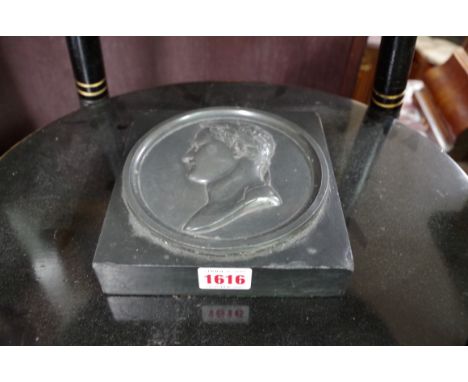 An antique lead relief portrait plaque of Napoleon,&nbsp;on slate mount, 15.5cm wide. 