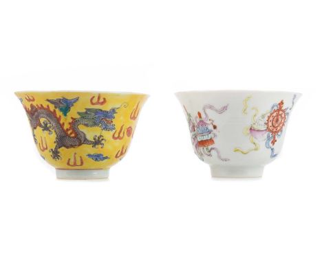 TWO CHINESE PORCELAIN TEA BOWLS,the first enamelled with auspicious Buddhist emblems and bearing six character Qianlong mark 