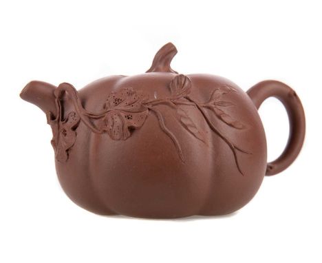 20TH CENTURY CHINESE YIXING POTTERY TEAPOT,modelled as a melon with applied floral detail, impressed mark to base, 14.5cm lon