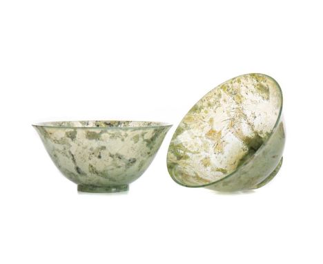 PAIR OF CHINESE JADE BOWLS,9.9cm diameter (2)Natural internal fissures, inclusions and other structural irregularities but no