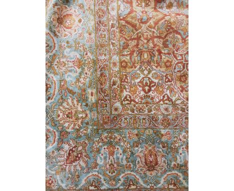 KASHAN SILK RUG,with central medallion and floral designs on a cream ground, 440cm x 310cmLight general wear, some minor dirt