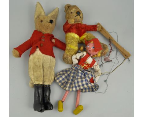 Painted wooden Pelham puppet, (no box), composition dolls and a child's push-along horse, other dolls and soft toys, (a quant