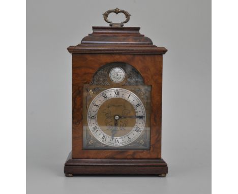Pearce &  Son, "Elliott" mantel clock in walnut case, height 29cm.
