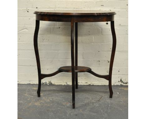 Edwardian walnut window table, oval top with a moulded edge, cabriole legs joined by a shelf, top 68cm x 54cm, height 74cm.