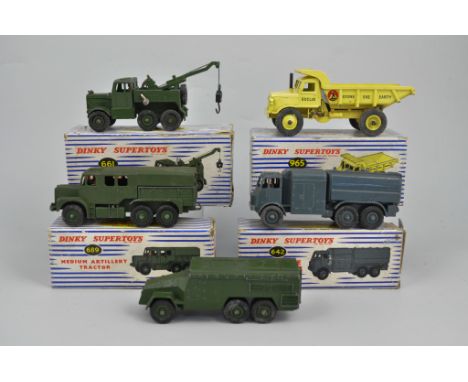 Dinky Supertoys Recovery Tractor, No. 661, an Illucid rear Dump Trunk, No. 965, a medium Artillery Tractor, No. 689, a Pressu
