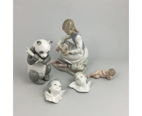 Nao porcelain model, Panda with bamboo, height 17cms, a Nao model of a girl, Nao model of a baby and two Lladro cherub masks,