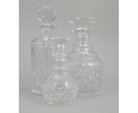 Pair of small Stuart cut-glass decanters with stoppers, height 17cms, a large Stuart cut-glass mallet decanter and two other 