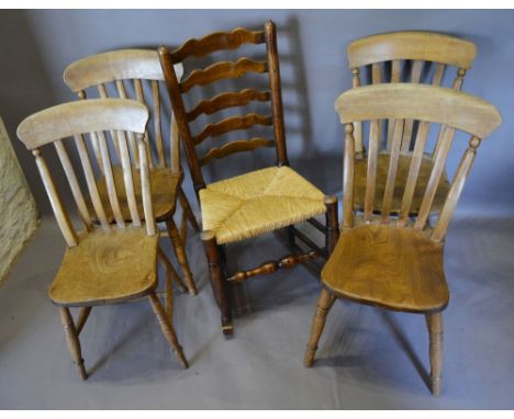 An Early 19th Century Lancashire Oak Ladder Back Chair with Rush Seat, converted to a rocking chair, together with a set of f