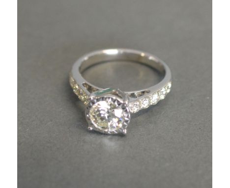 An 18ct White Gold Solitaire Diamond Ring with Diamond Shoulders, solitaire 0.90ct, total diamond weight approximately 1.45