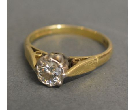 An 18ct Gold Solitaire Diamond Ring, the single diamond within a pierced setting, approximately 0.50 ct