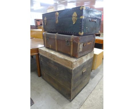 Two early 20th Century steamer trunks and a large trunk 