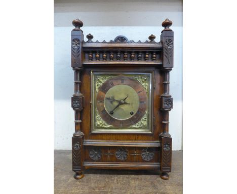 A 19th Century W&amp;H. Sch carved oak bracket clock 