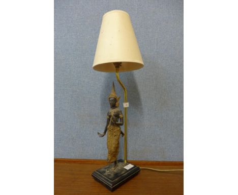 A figural Eastern deity table lamp 