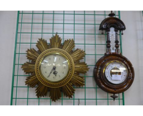 A Smiths 8-day gilt sunburst wall clock and a carved walnut aneroid barometer 