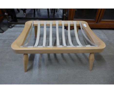An Ercol Blonde beech footstool 