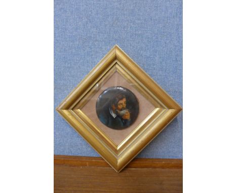 A German School portrait miniature of a gentleman, oil on paper mache, framed 