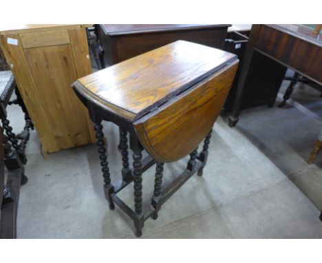 An oak bobbin turned gateleg table 