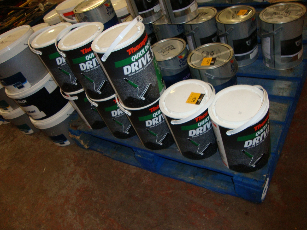 8 off 5 litre tubs of Thompson's black quick drying drive seal