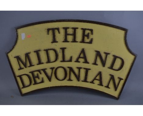 THE MIDLAND DEVONIAN, a cast aluminium B.R. Style locomotive headboard, cream background with raised lettering and edge paint