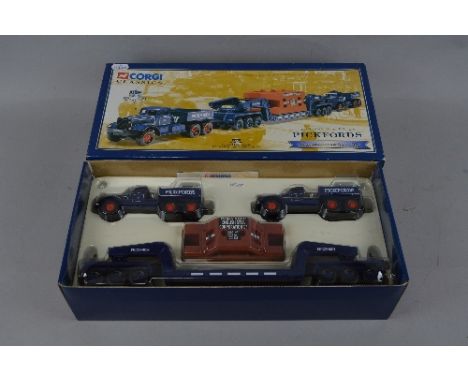 A BOXED CORGI CLASSICS HEAVY HAULAGE RANGE DIAMOND T BALLAST (X2), with 24 wheel Girder Trailer and Steel Casting Load-Pickfo