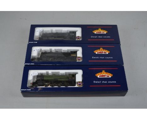 THREE BOXED BACHMANN OO GAUGE W.D. AUSTERITY LOCOMOTIVES, No.3085, L.N.E.R. black livery (32-254), No.3165, W.D. 21st Army Tr