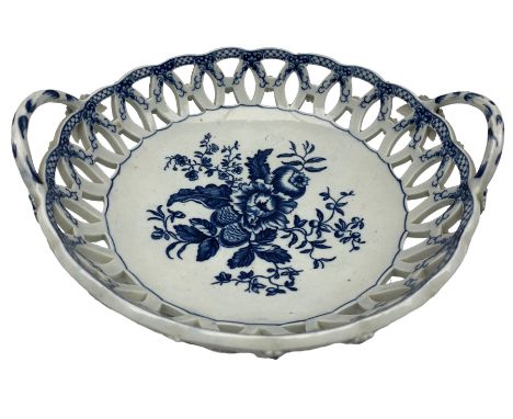 18th century Worcester blue and white circular two handled bowl with pierced border, central floral spray, the exterior with 