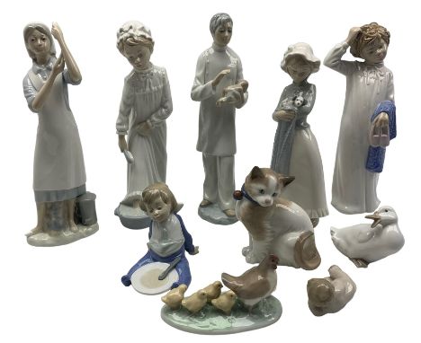 Ten Nao figures including; doctor, nurse, girl in nightgown together with various other models max H29cm (10)