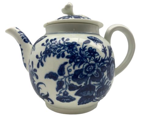 18th century Worcester globular teapot and cover decorated in blue and white with flowers and butterflies, the cover with bud