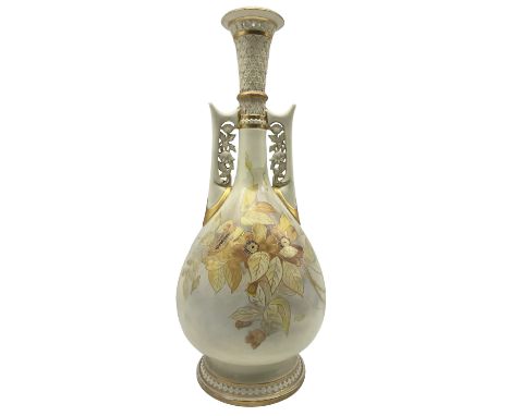 Victorian Royal Worcester Persian style vase, of pear form with twin floral pierced mounted handles and lattice slender neck,