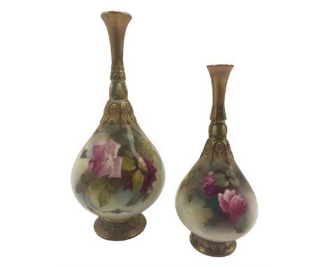 Two early 20th century Royal Worcester vases, of bottle form with relief moulded slender necks, each hand painted with roses,